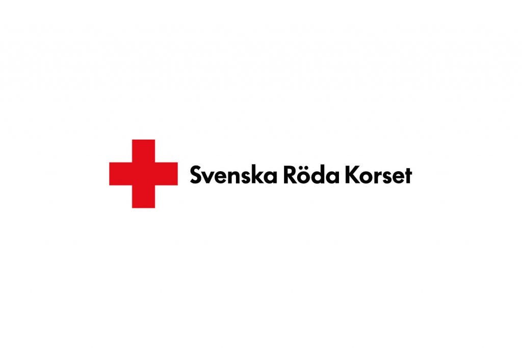 Ett rött kors och texten Svenska Röda Korset